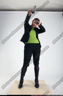 2012 01  NADIYA DUAL PISTOLS POSE1 00 C